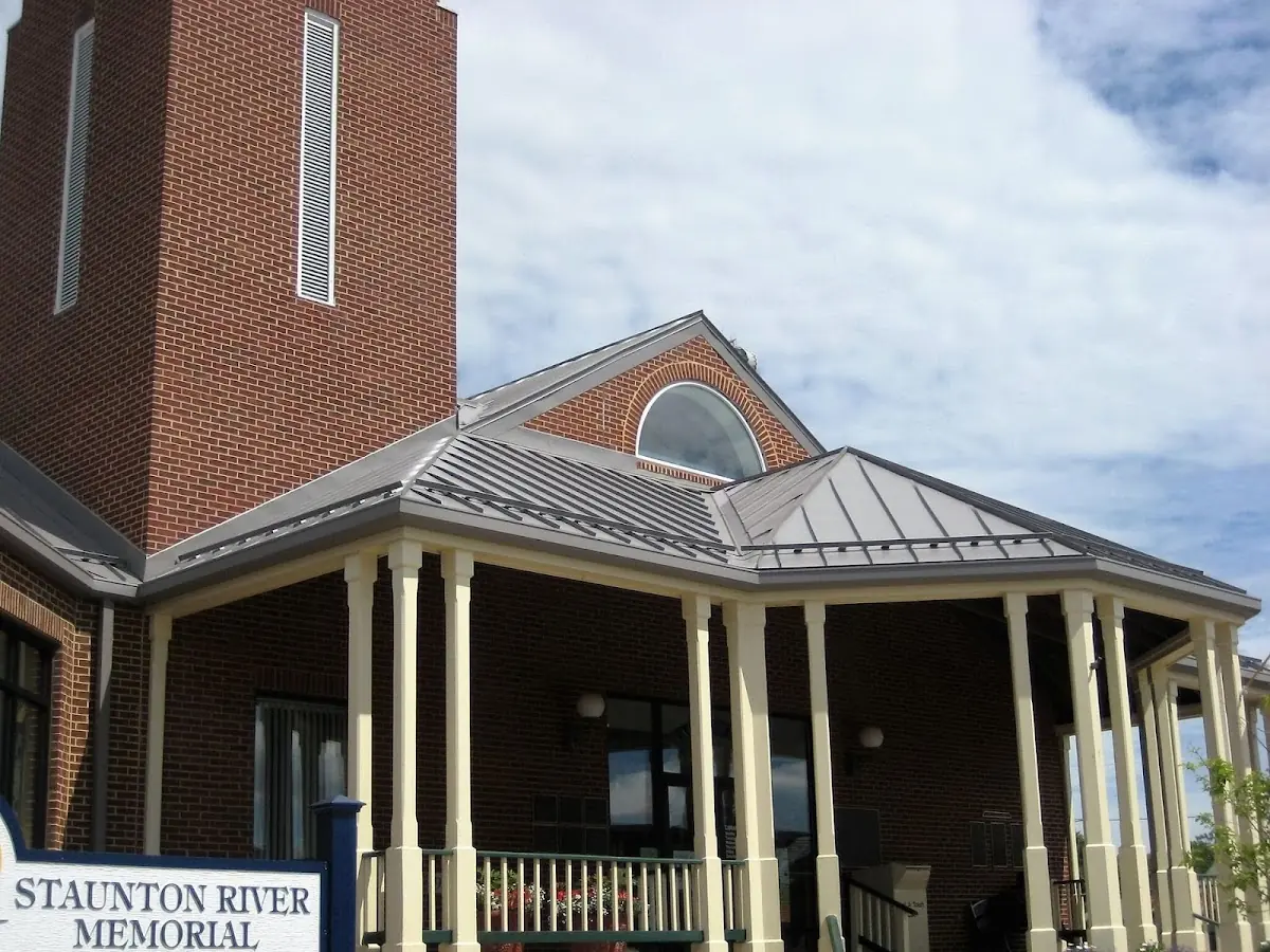 Skilled roofing craftsmen working on a residential roof in Campbellsville